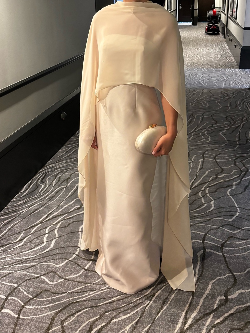 Elegant Cream Cape and champagne strapless Gown